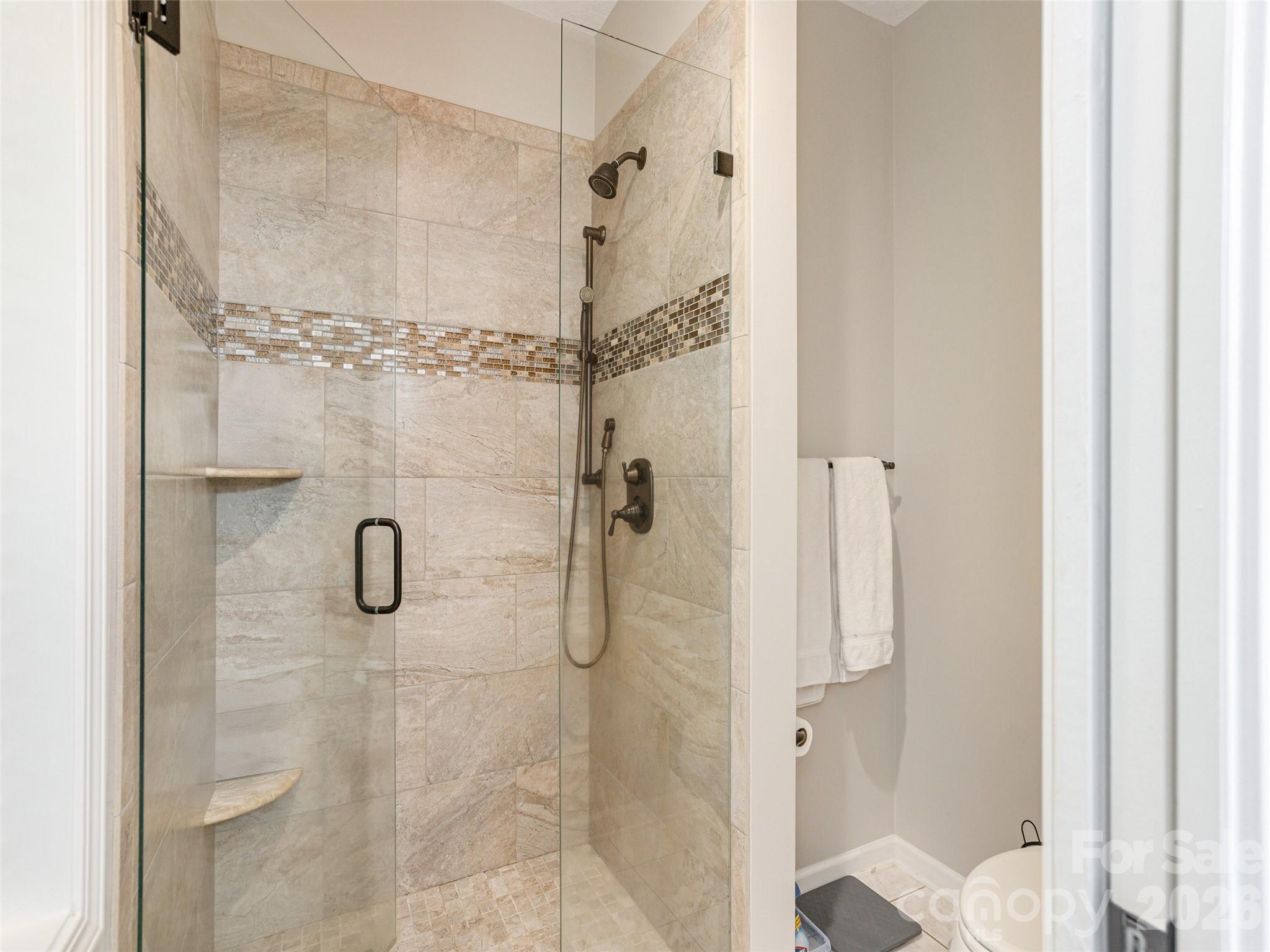 417 Blue Mist Way Arden, NC 28704 - Photo 26 of 48 a bathroom with a shower