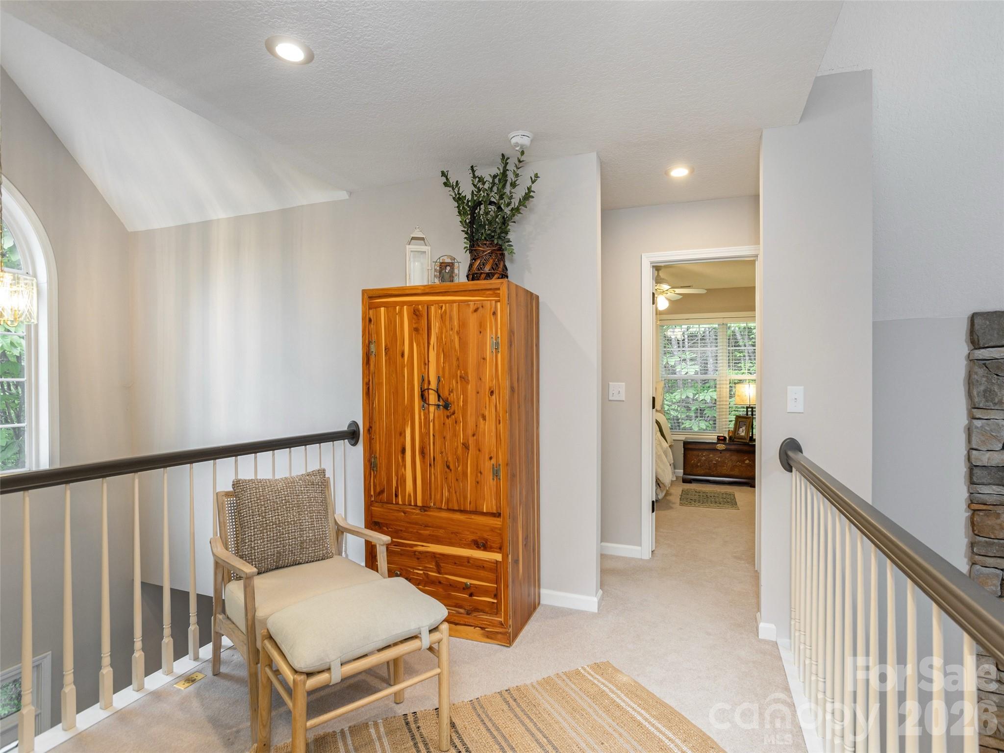 417 Blue Mist Way Arden, NC 28704 - Photo 29 of 48 a view of a hallway with bathroom and wooden floor