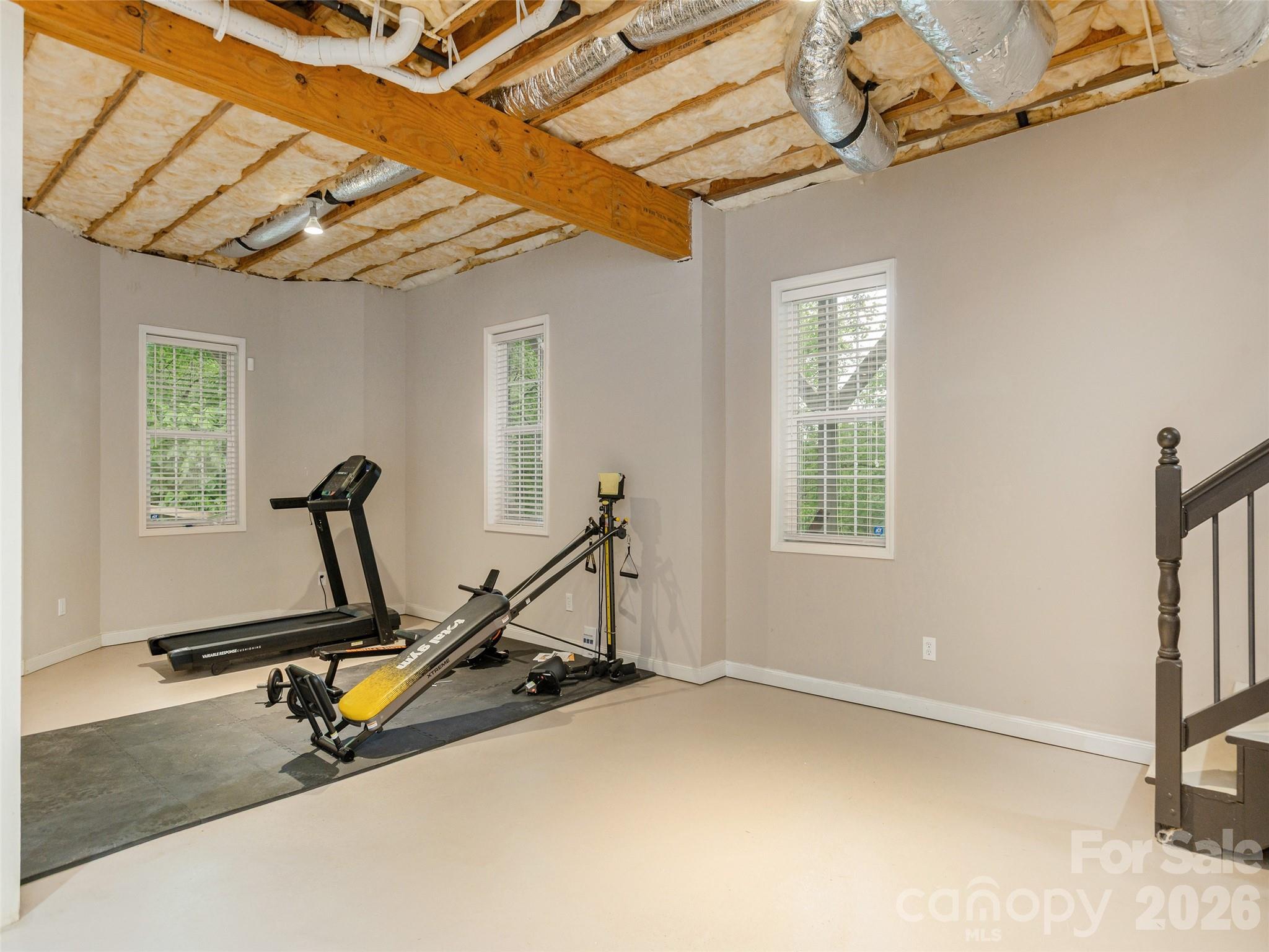 417 Blue Mist Way Arden, NC 28704 - Photo 36 of 48 a view of a room with gym equipment