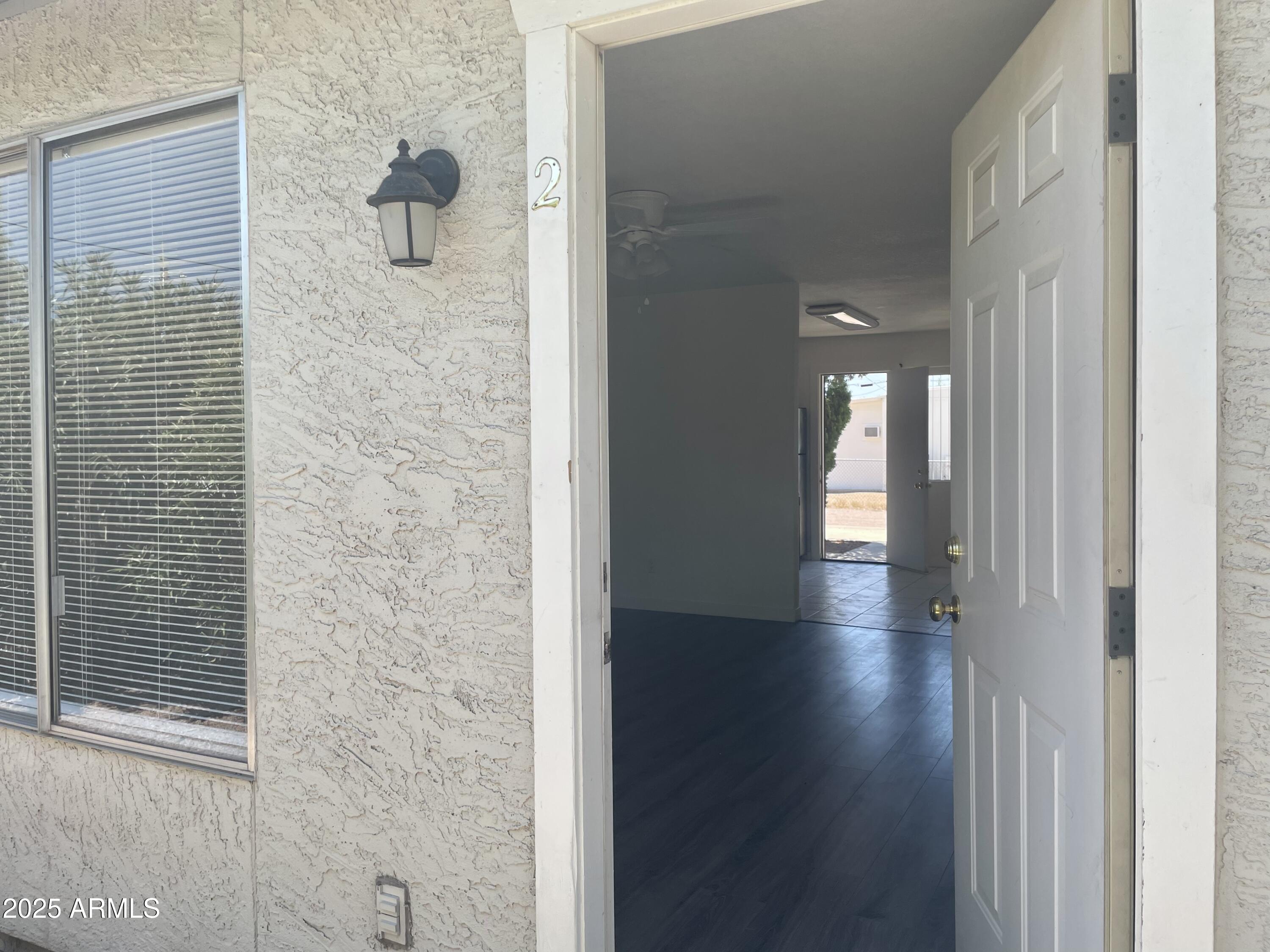 143 South Mountain Road Apache Junction, AZ 85120 - Photo 34 of 38 a view of a bathroom from the hallway
