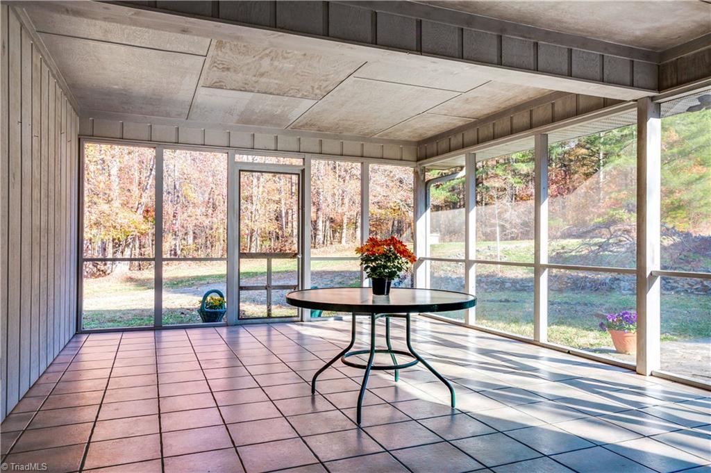 Enjoy the view and privacy on the screened in porch