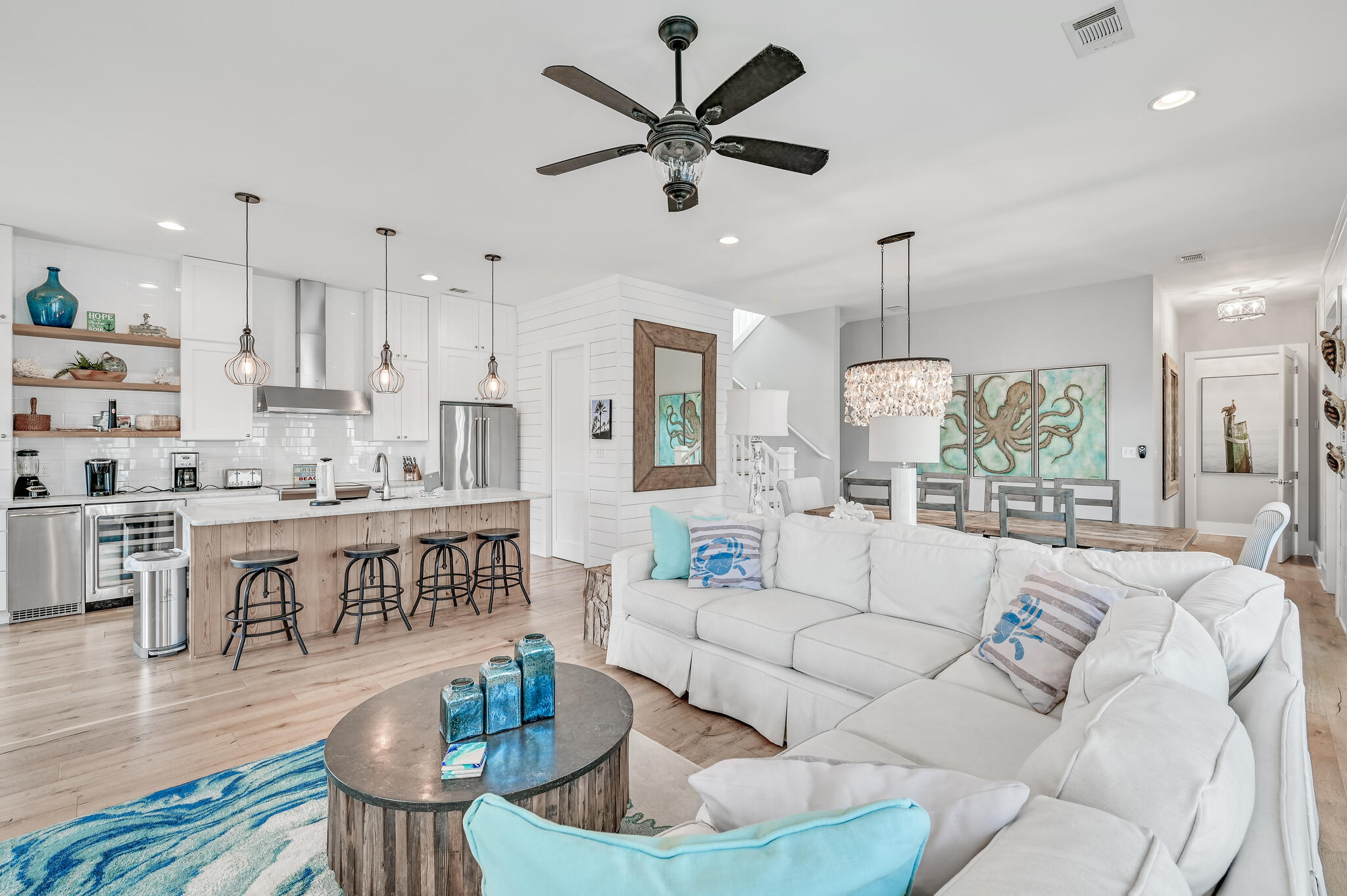 401 Blue Mountain Road Santa Rosa Beach, FL 32459 - Photo 10 of 60 a living room with stainless steel appliances kitchen island furniture and a view of kitchen