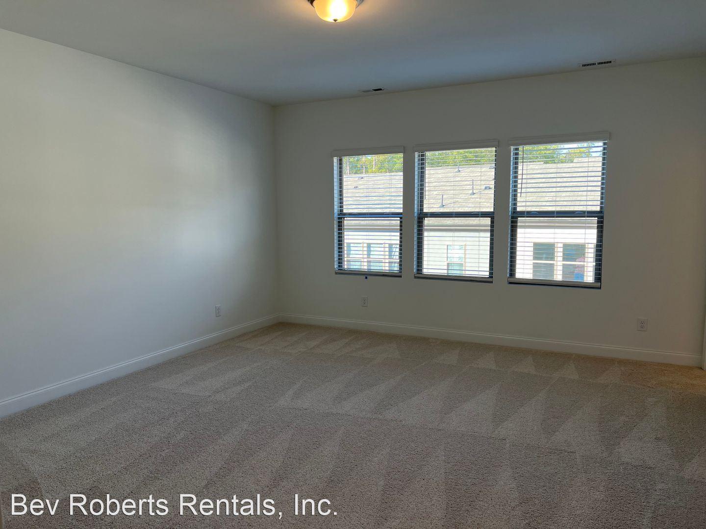 2104 Stegemann Street Apex, NC 27502 - Photo 11 of 29 an empty room with a window