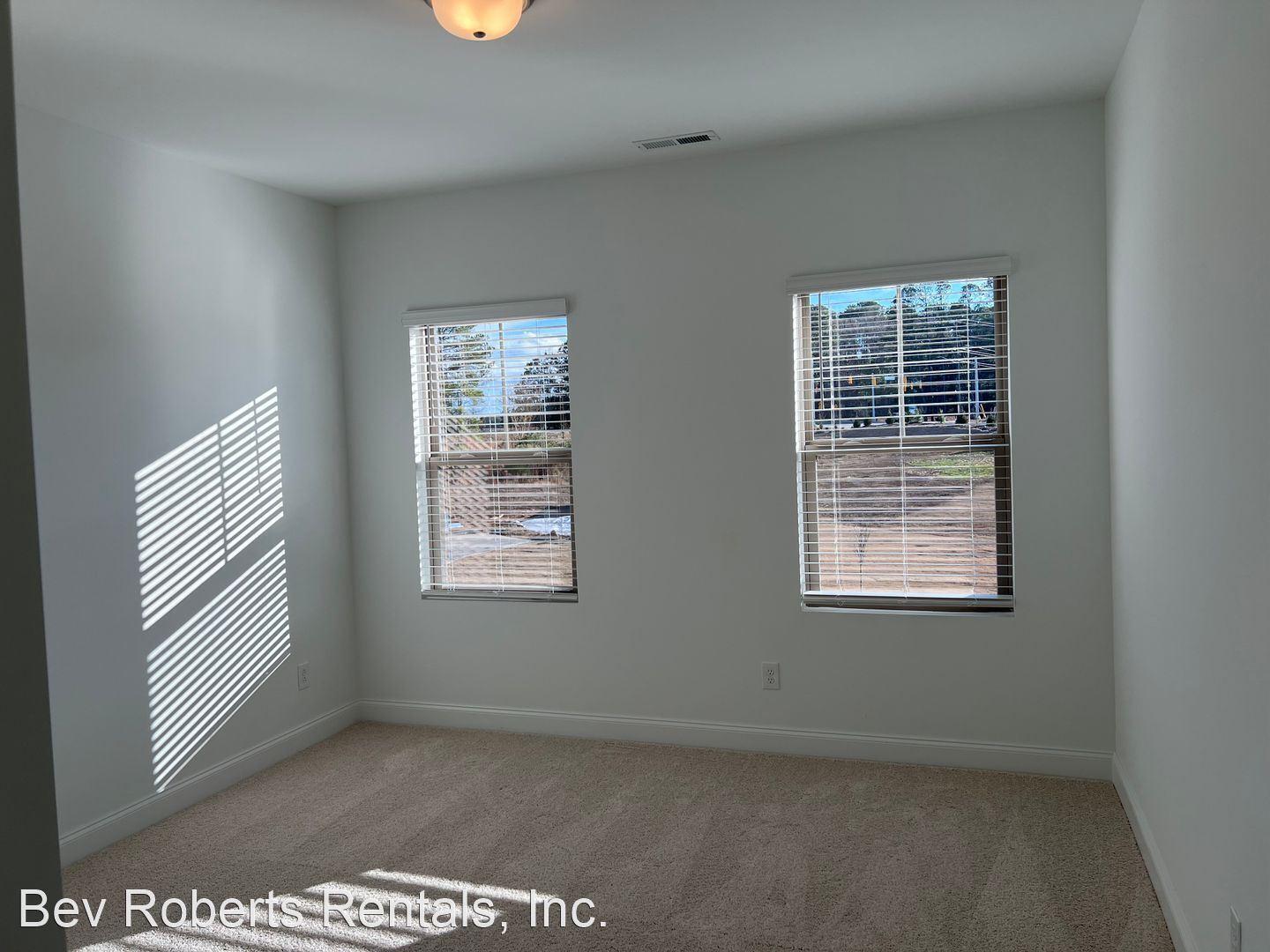 2104 Stegemann Street Apex, NC 27502 - Photo 18 of 29 a view of an empty room with a window