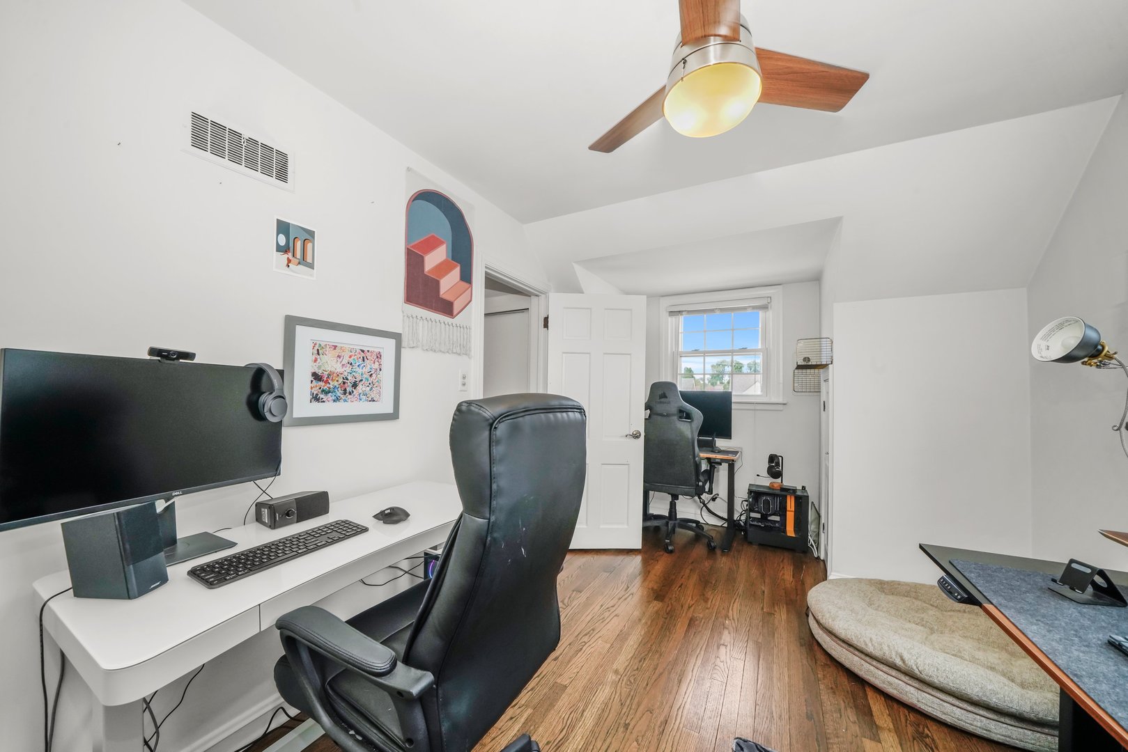7801 West Victoria Street Chicago, IL 60631 - Photo 14 of 30 a view of a workspace with furniture and wooden floor