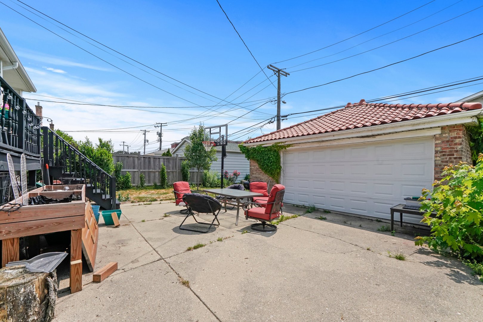 7801 West Victoria Street Chicago, IL 60631 - Photo 24 of 30 a view of a patio with table and chairs under an umbrella