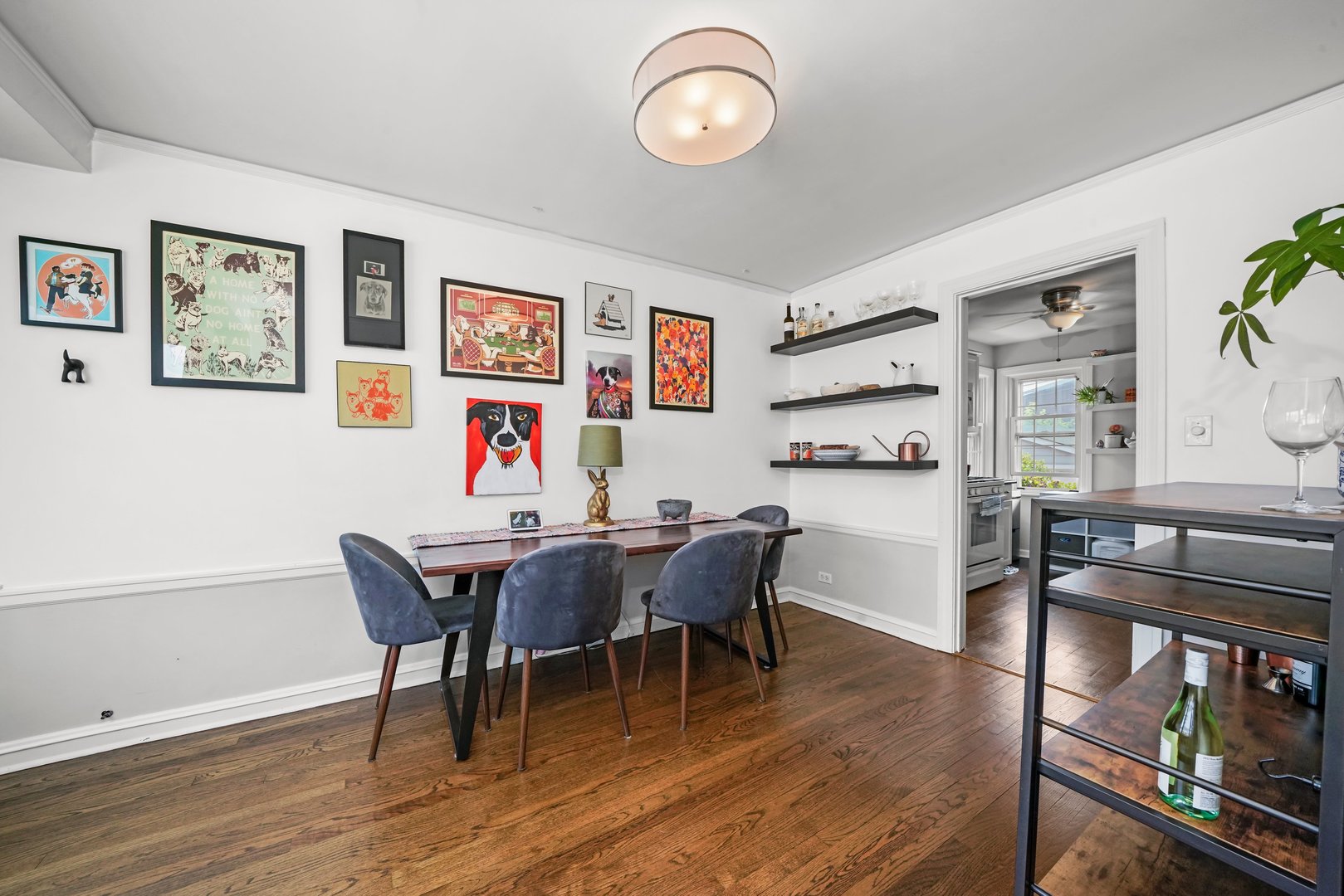7801 West Victoria Street Chicago, IL 60631 - Photo 8 of 30 a view of a dining room with furniture and wooden floor