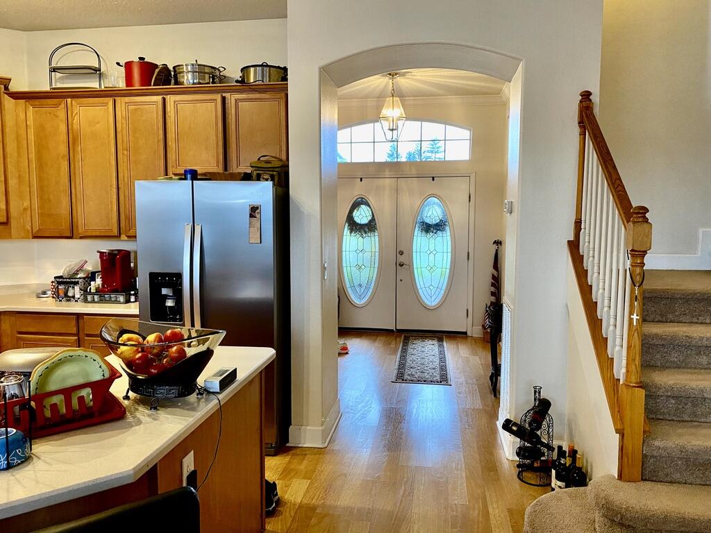 4751 Chardonnay Drive Rockledge, FL 32955 - Photo 6 of 25 a living room with blue floor furniture and a window