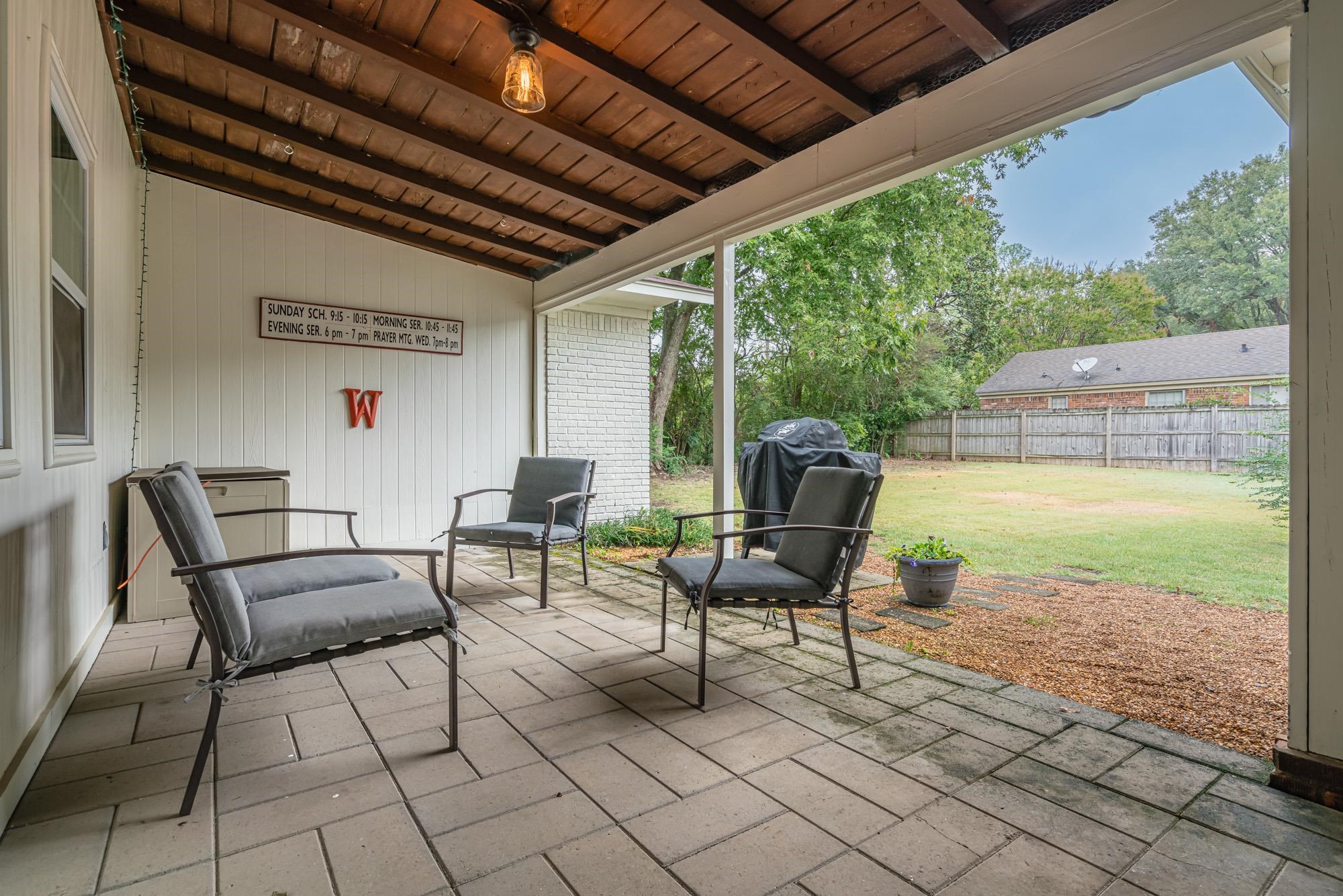 5356 Quince Road Memphis, TN 38119 - Photo 18 of 21 a building outdoor space with patio furniture and potted plants