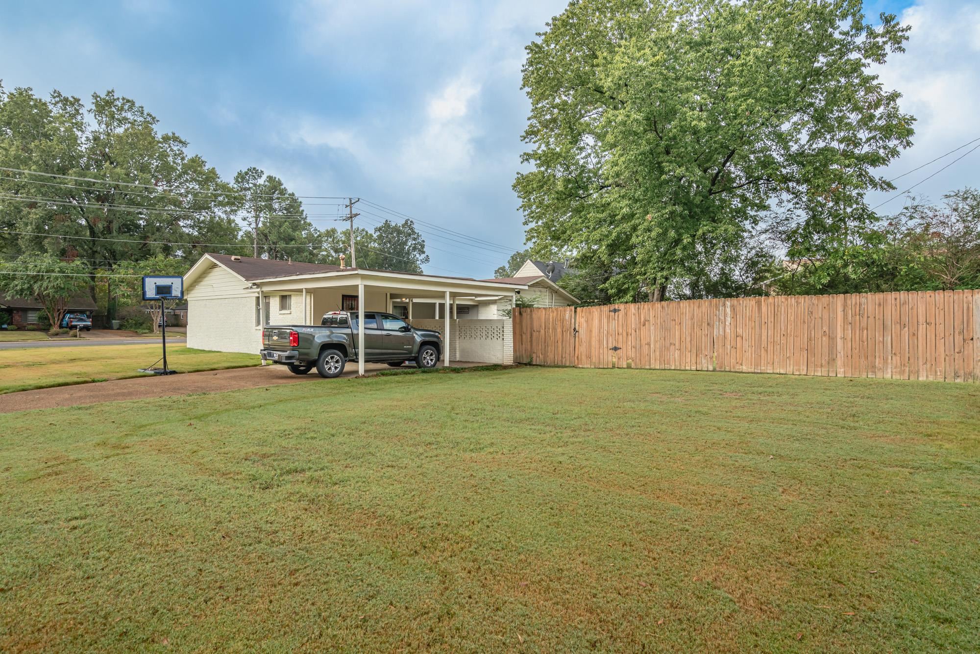 5356 Quince Road Memphis, TN 38119 - Photo 20 of 21 a view of a house with a yard
