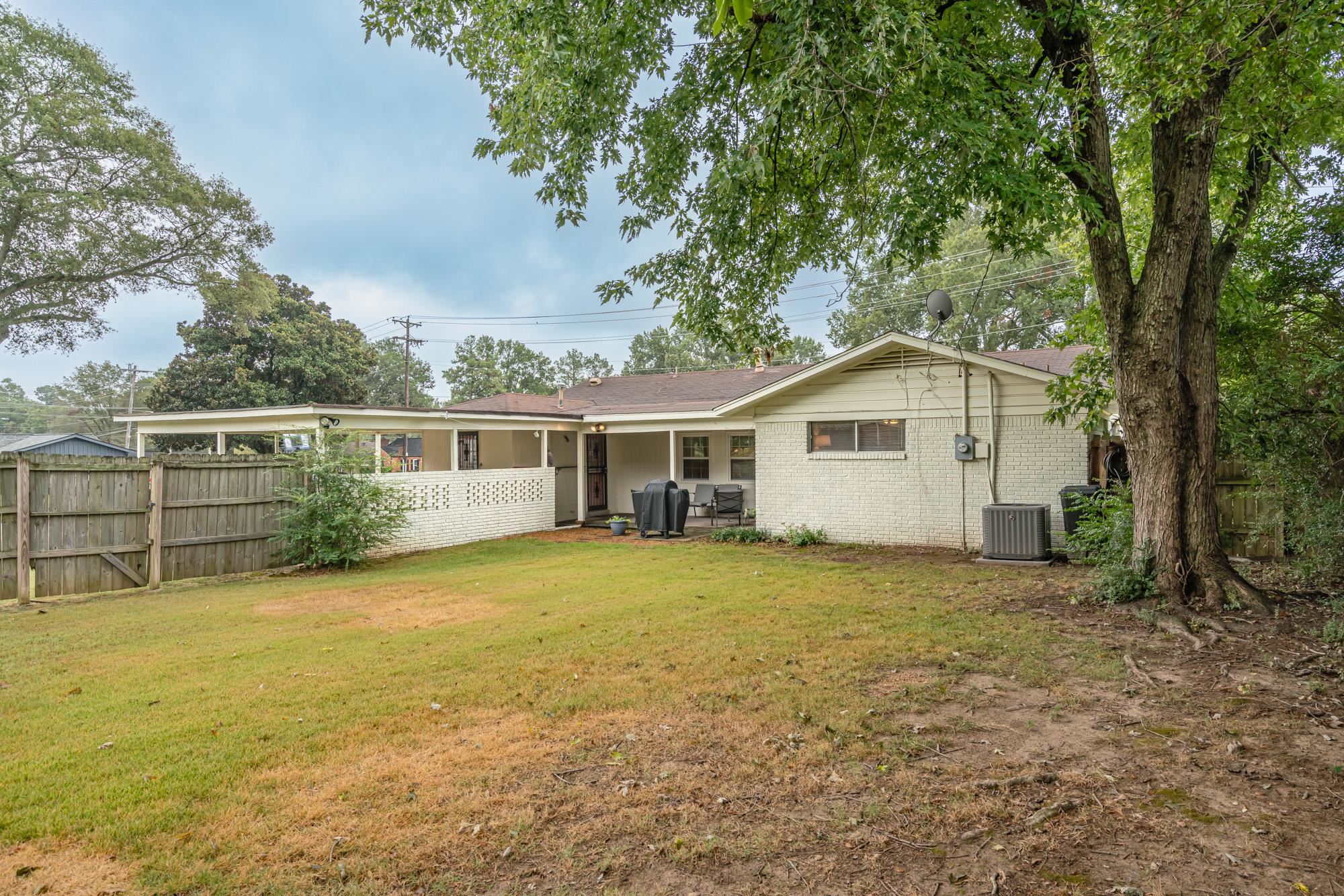 5356 Quince Road Memphis, TN 38119 - Photo 21 of 21 a view of a house with a yard