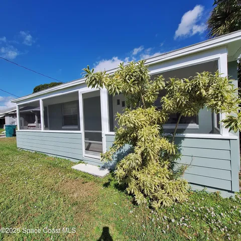 a house view with a garden space