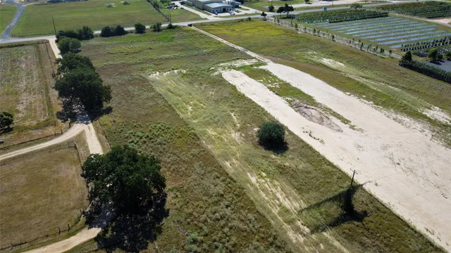 a view of a wooden floor with a lake view
