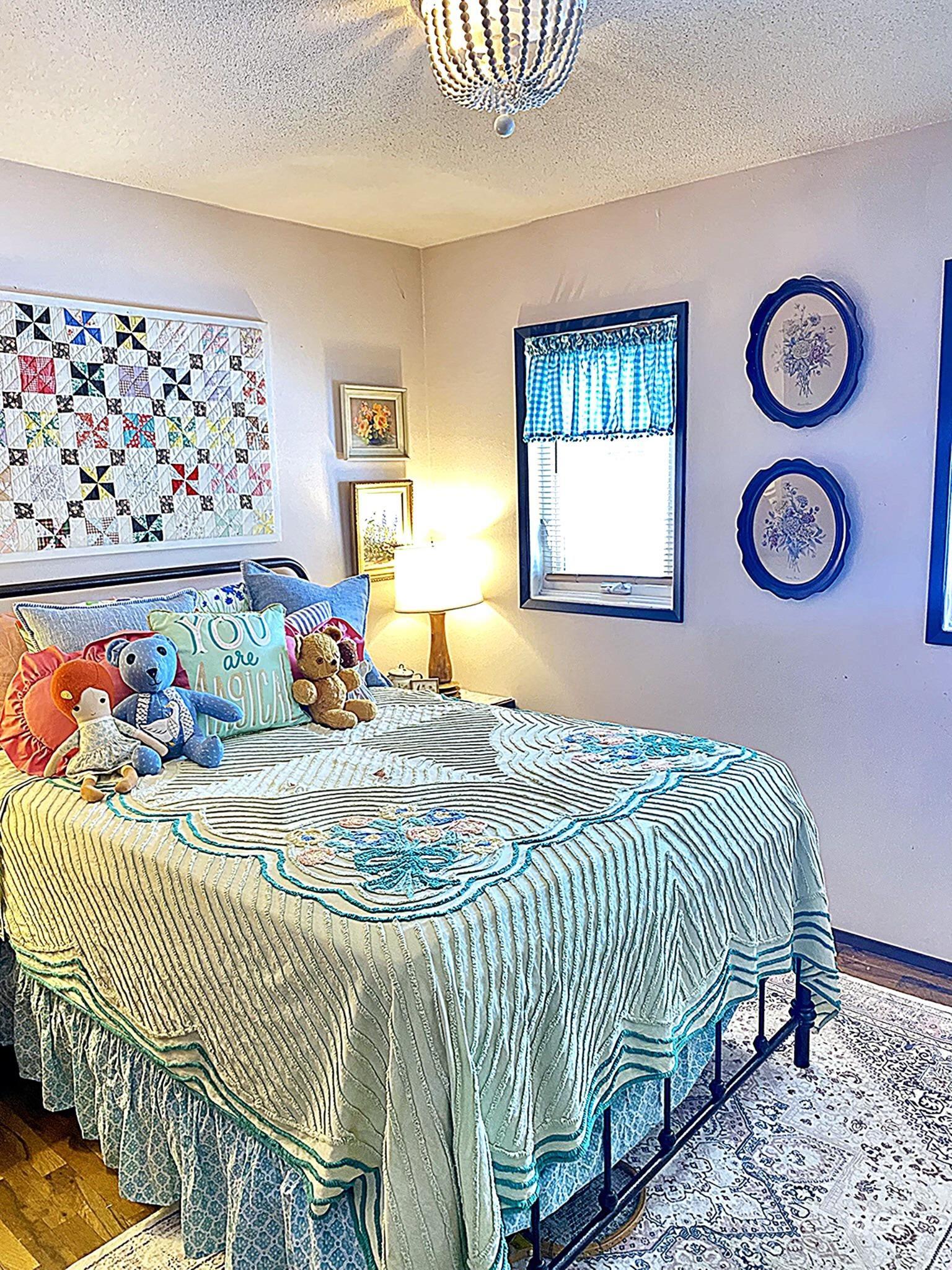 138 Timberline Drive Pierce, ID 83546 - Photo 18 of 28 Bedroom featuring wood finished floors and a textured ceiling