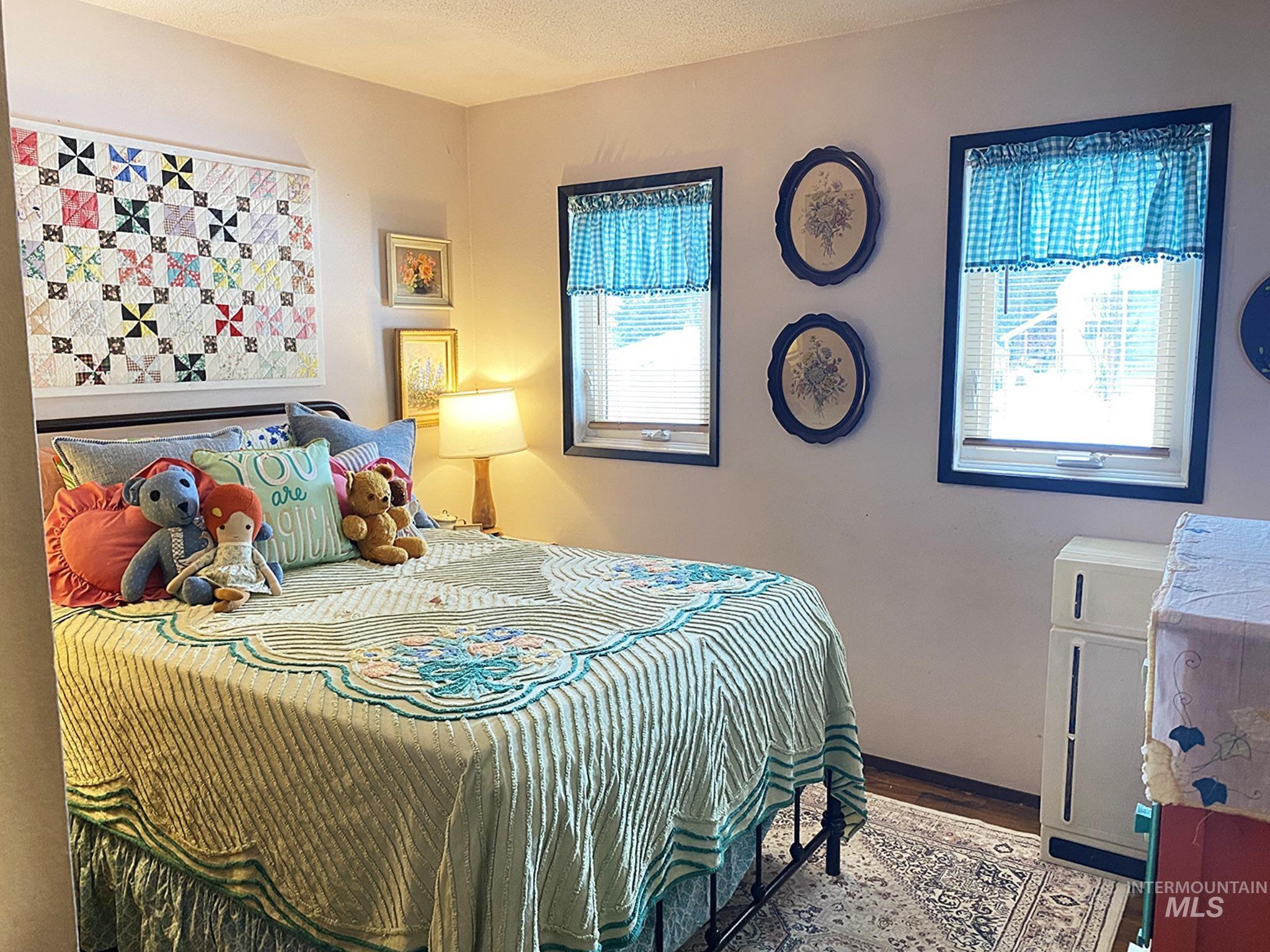 138 Timberline Drive Pierce, ID 83546 - Photo 19 of 28 Bedroom featuring light wood-style floors