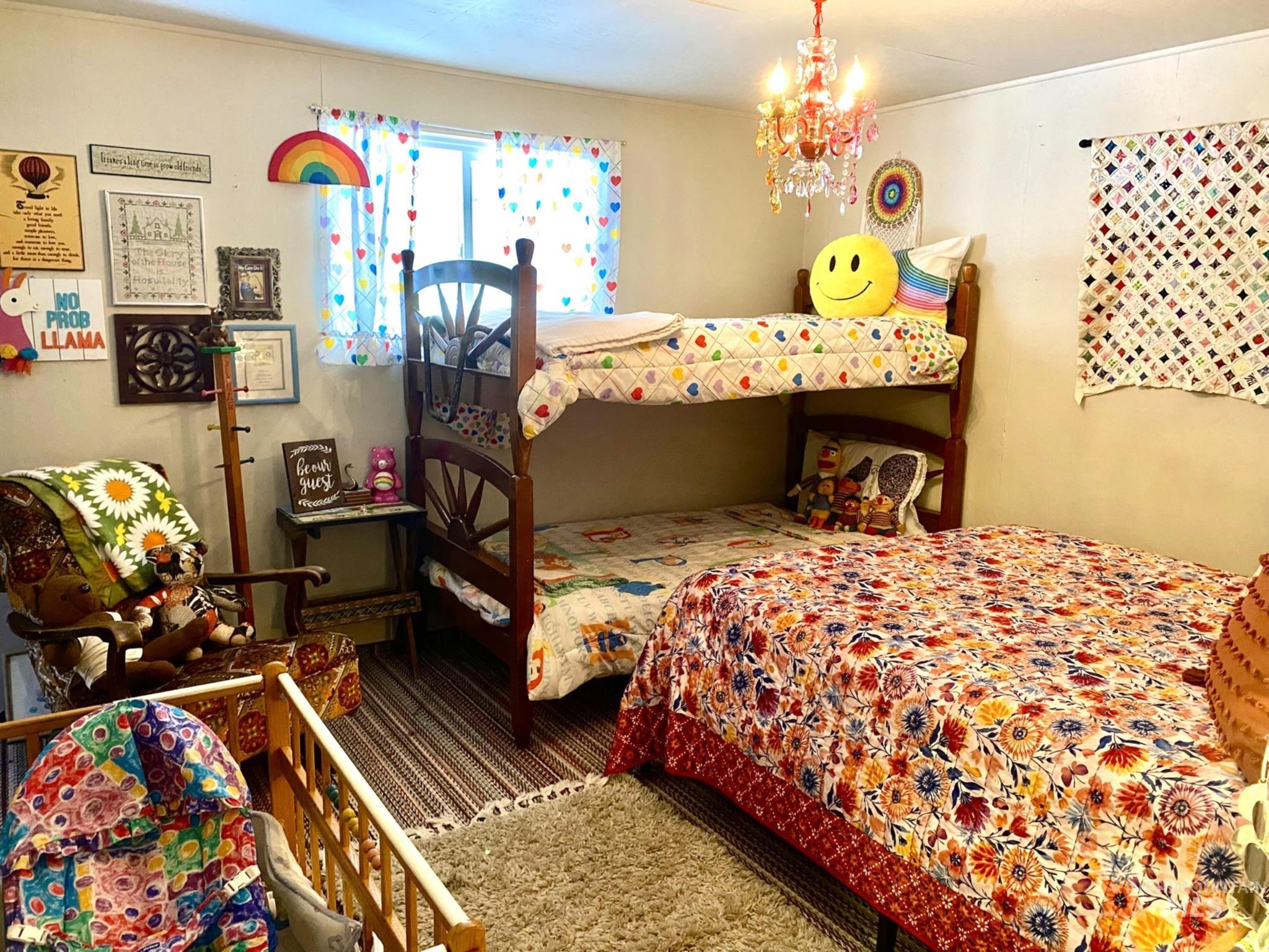 138 Timberline Drive Pierce, ID 83546 - Photo 23 of 28 Carpeted bedroom featuring suspended lighting