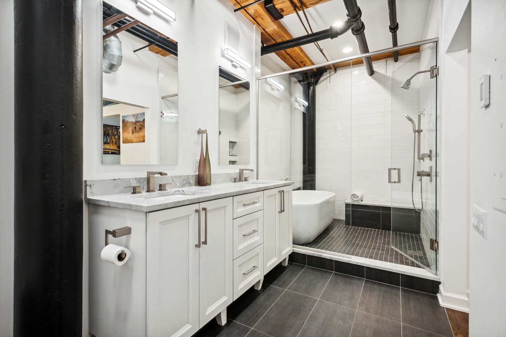 1000 West Washington Boulevard, Unit 148 Chicago, IL 60607 - Photo 18 of 18 a bathroom with a double vanity sink and mirror with toilet