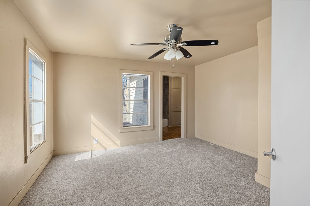 1200 North Street Kerrville, TX 78028 - Photo 21 of 50 a view of an empty room with a window