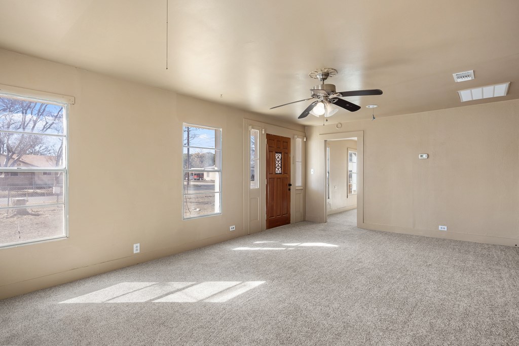 1200 North Street Kerrville, TX 78028 - Photo 23 of 50 a view of a livingroom with a ceiling fan and window