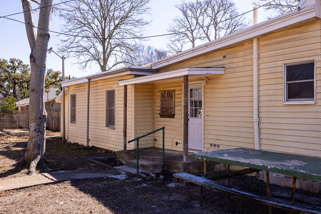 1200 North Street Kerrville, TX 78028 - Photo 33 of 50 a view of a house with a yard