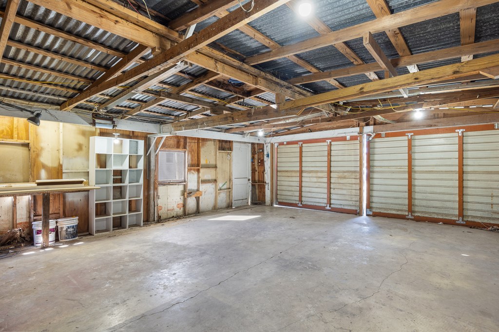 1200 North Street Kerrville, TX 78028 - Photo 40 of 50 a view of an empty room with wooden ceiling