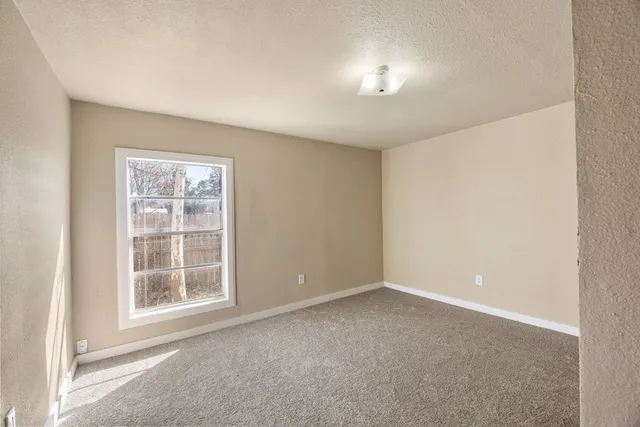 a utility room with sink dryer and washer
