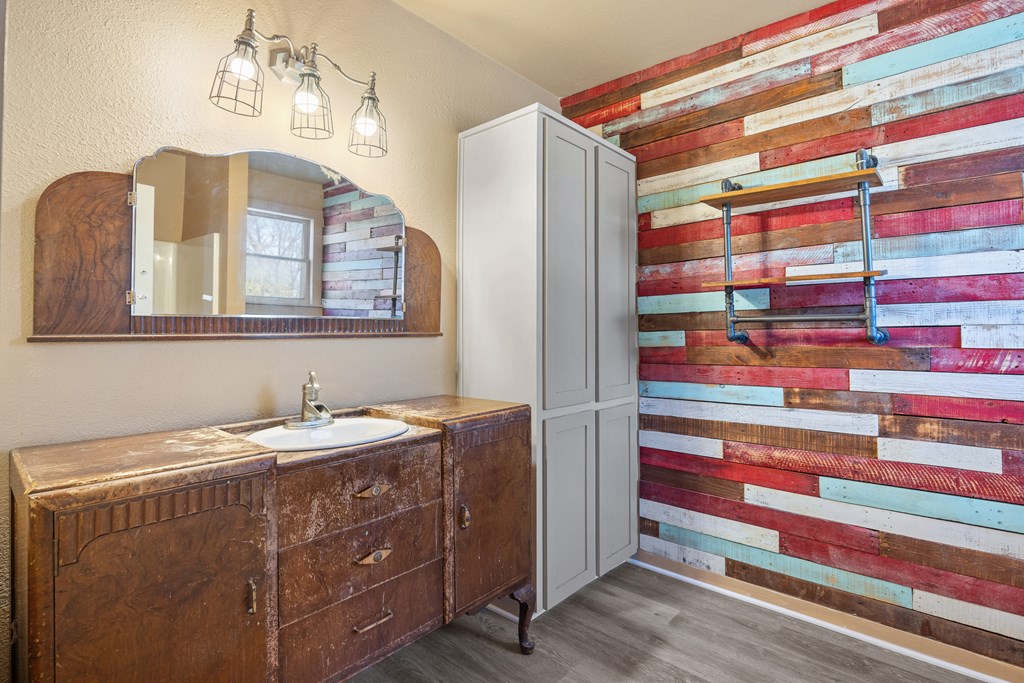 1200 North Street Kerrville, TX 78028 - Photo 50 of 50 a bathroom with a sink and a mirror