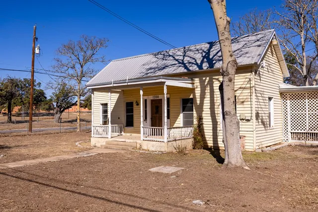 a front view of a house with a garage