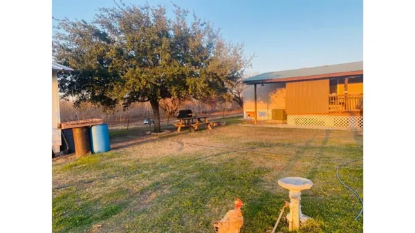 a view of outdoor space and yard