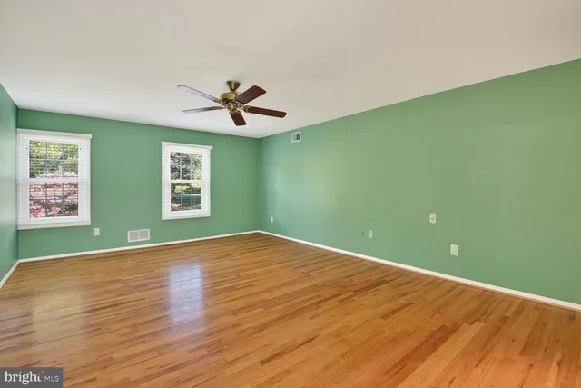 a view of a big room with wooden floor