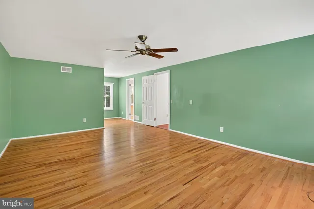 a view of a hallway view with staircase