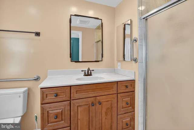 a view of an empty room with stairs