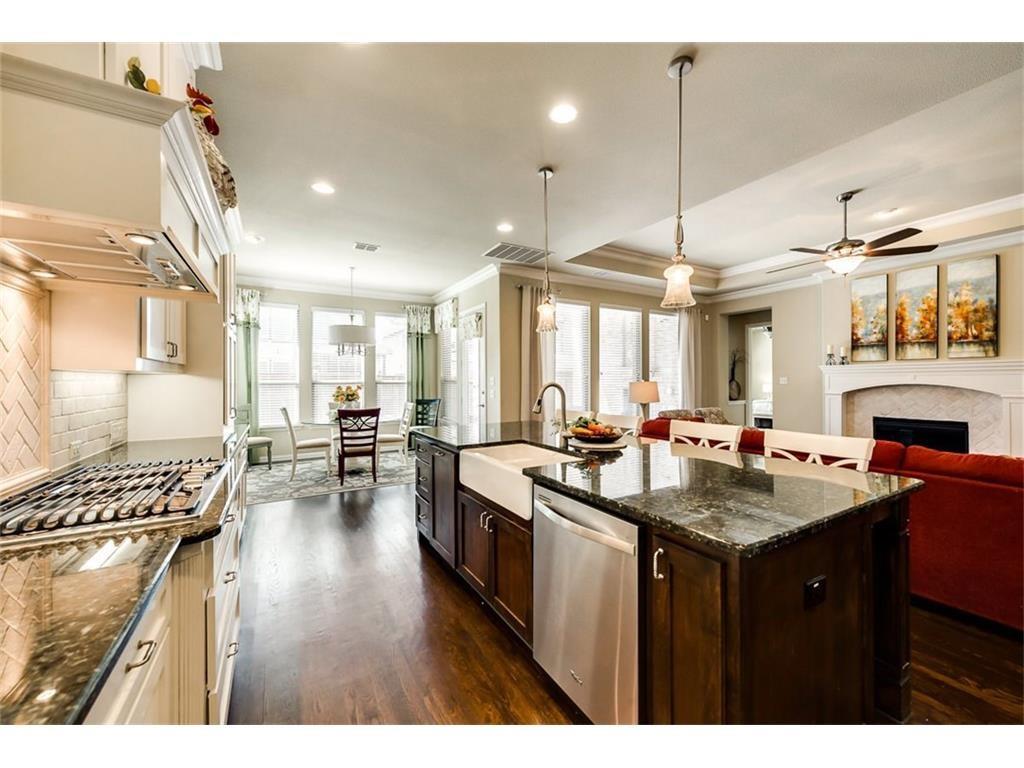 917 Pleasant View Drive Rockwall, TX 75087 - Photo 14 of 27 a kitchen with lots of counter top space and a sink