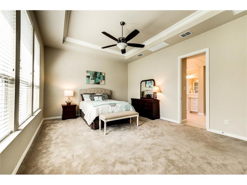 917 Pleasant View Drive Rockwall, TX 75087 - Photo 17 of 27 a bedroom with furniture and window