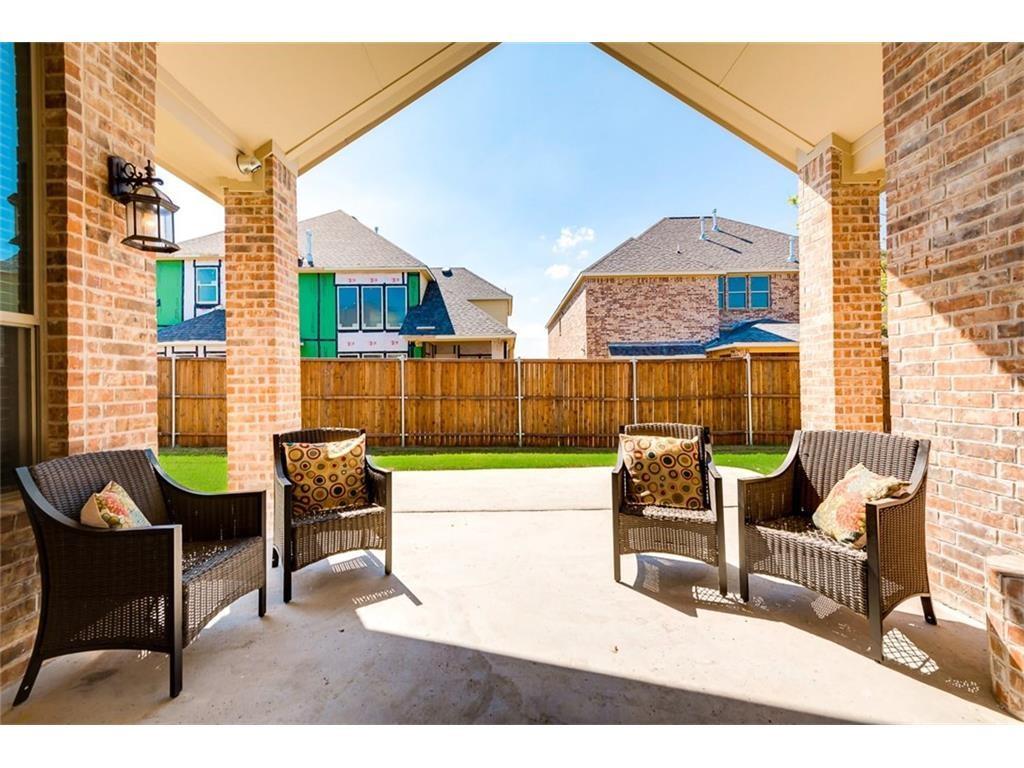 917 Pleasant View Drive Rockwall, TX 75087 - Photo 25 of 27 a outdoor space with patio the couches and a potted plant on a table