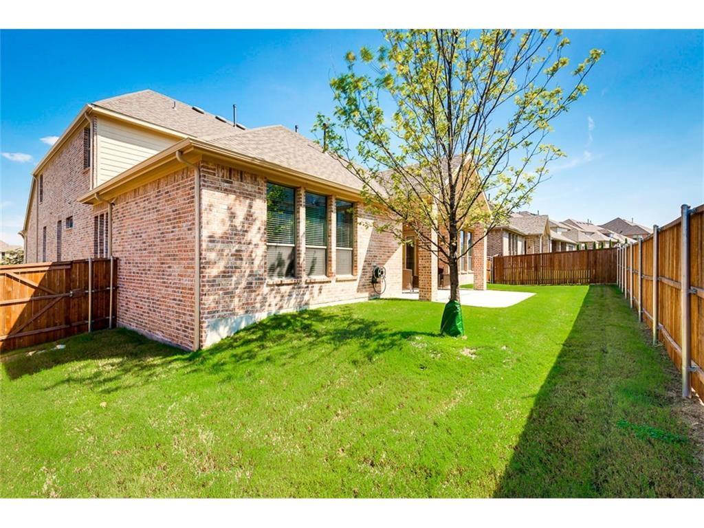 917 Pleasant View Drive Rockwall, TX 75087 - Photo 27 of 27 a view of a house with a yard