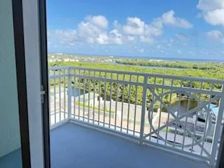 a view of balcony with furniture