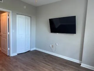 a bedroom with a bed and furniture