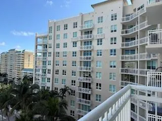 a view of a balcony with city view