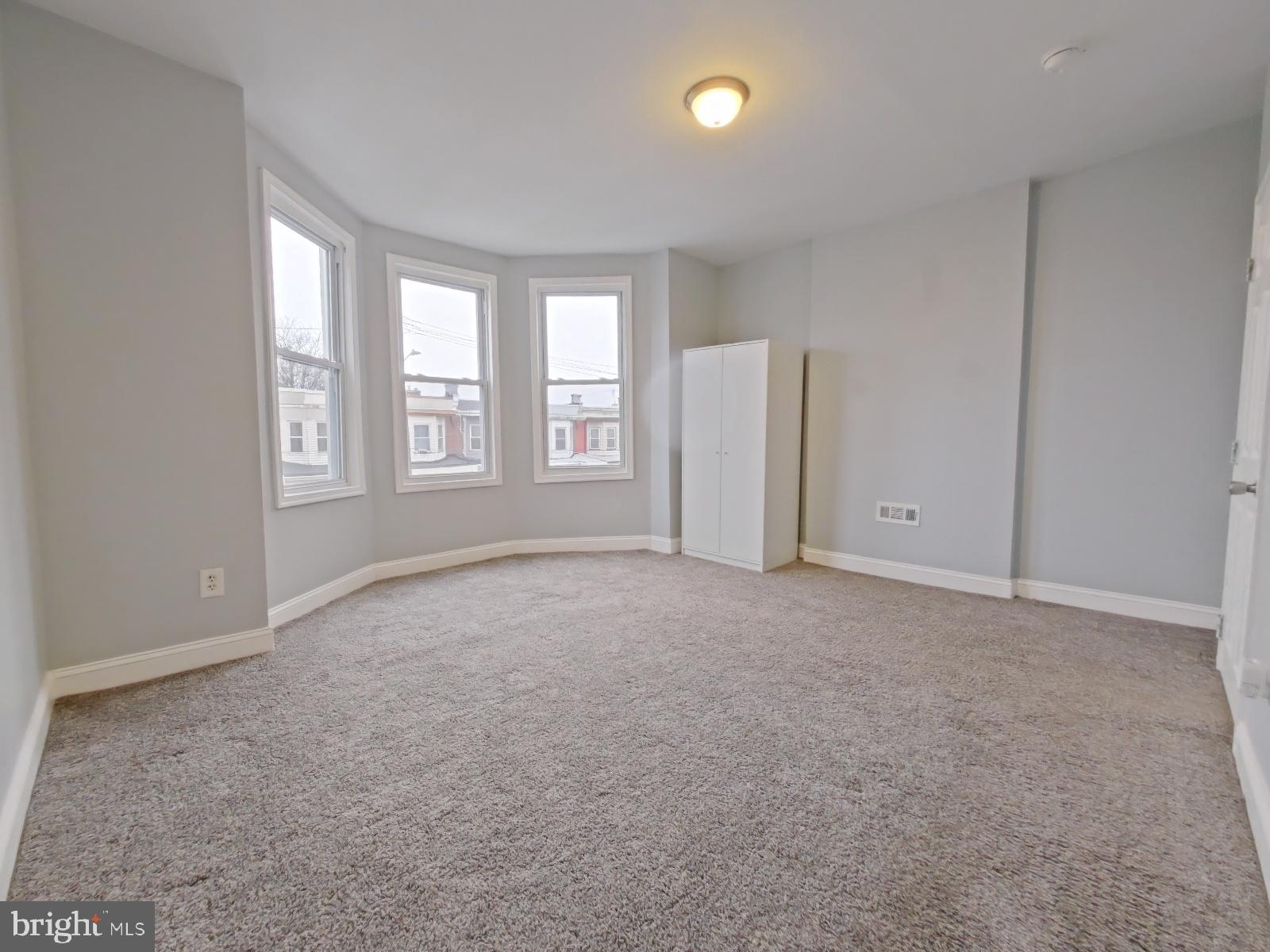 154 North 60th Street Philadelphia, PA 19139 - Photo 18 of 40 a view of an empty room with a window