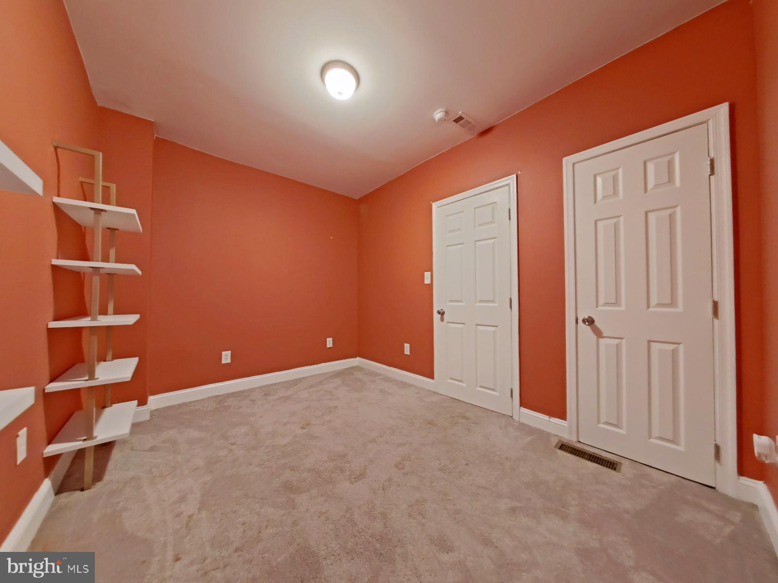 154 North 60th Street Philadelphia, PA 19139 - Photo 21 of 40 an empty room with empty shelves