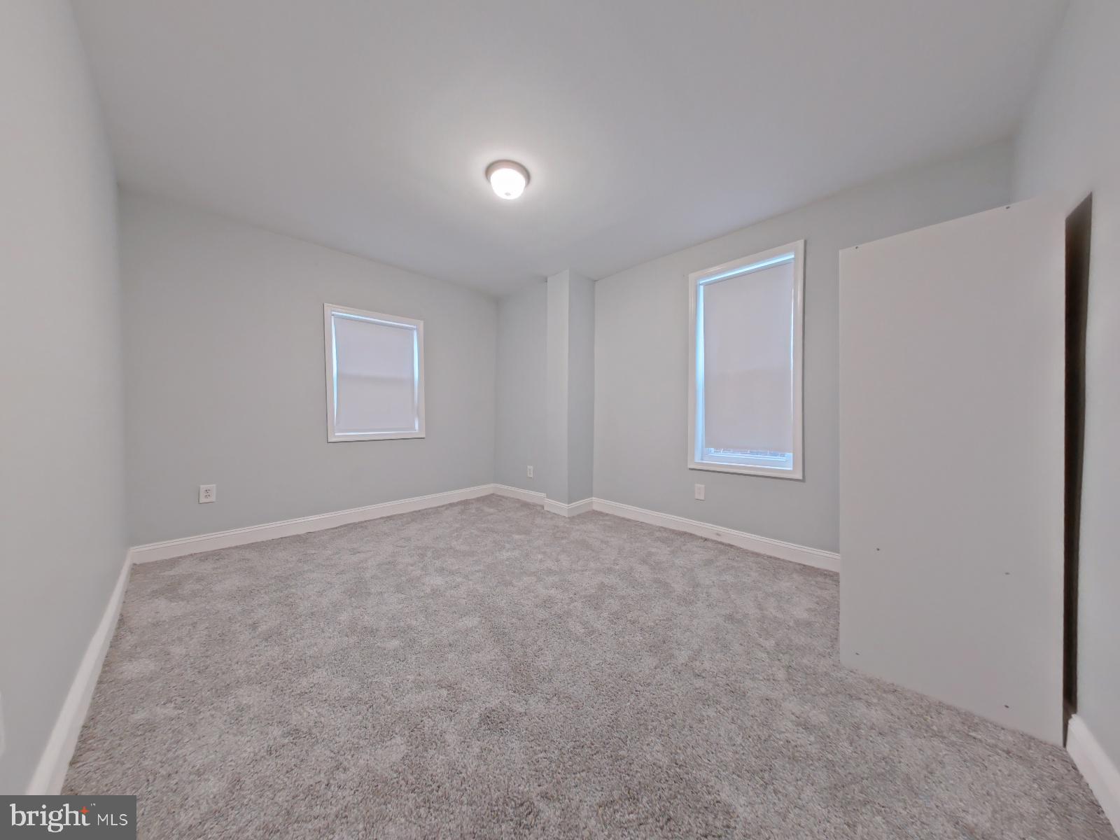 154 North 60th Street Philadelphia, PA 19139 - Photo 24 of 40 an empty room with windows