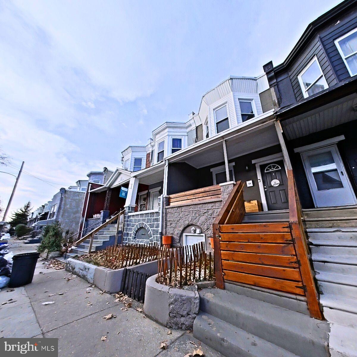 154 North 60th Street Philadelphia, PA 19139 - Photo 40 of 40 a front view of a house with a balcony