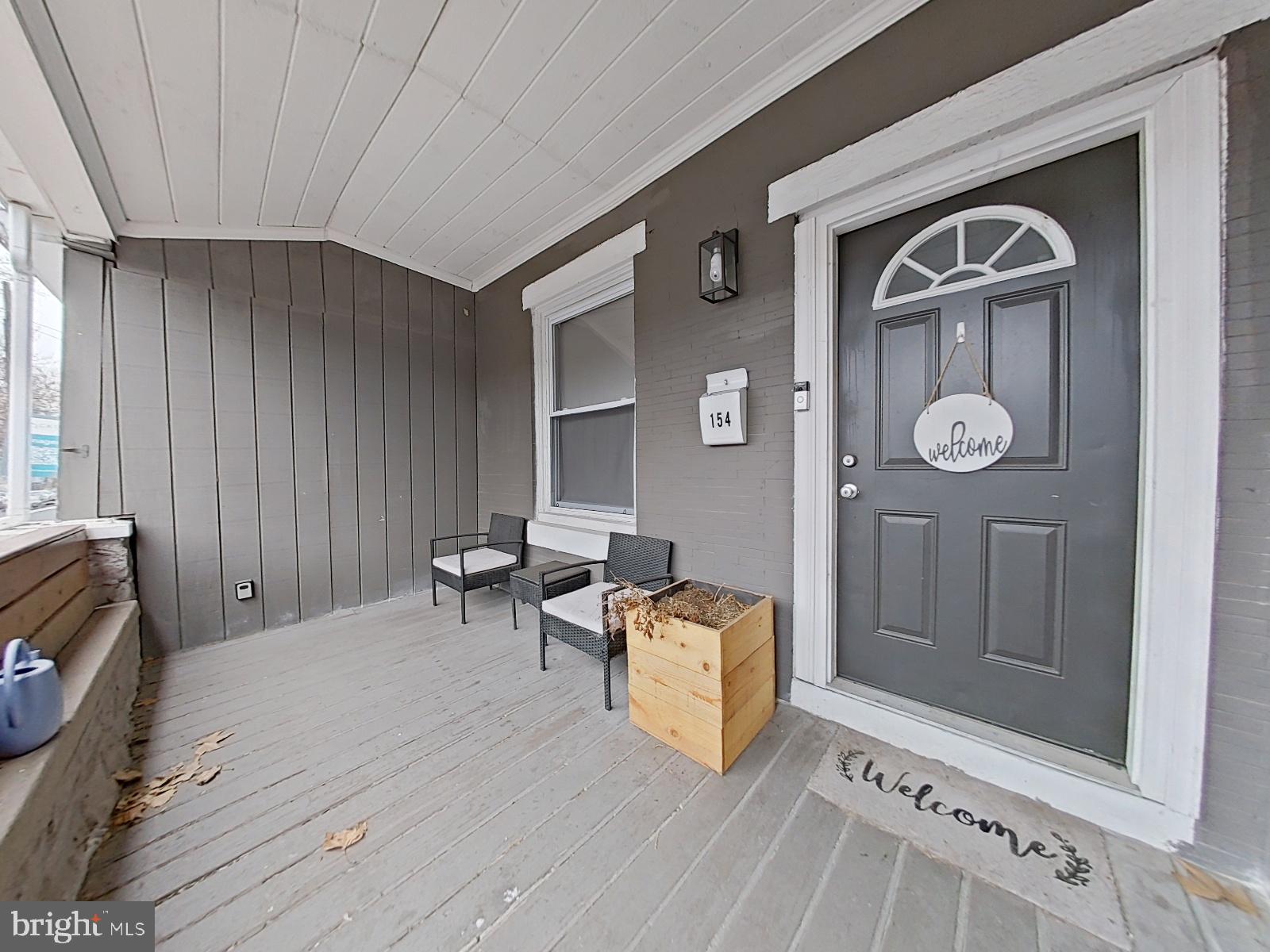 154 North 60th Street Philadelphia, PA 19139 - Photo 7 of 40 a view of livingroom with furniture and window