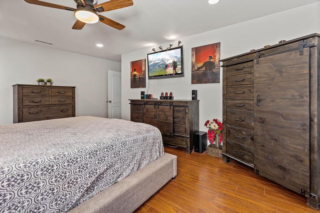 7017 Broadway Whittier, CA 90606 - Photo 18 of 32 a bedroom with a bed and a dresser