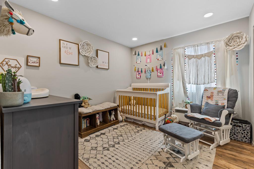 7017 Broadway Whittier, CA 90606 - Photo 26 of 32 a bedroom with furniture and a window