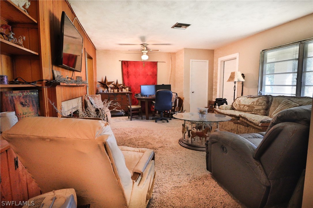 4260 Staley Road Fort Myers, FL 33905 - Photo 8 of 16 a living room with furniture a couch and a window
