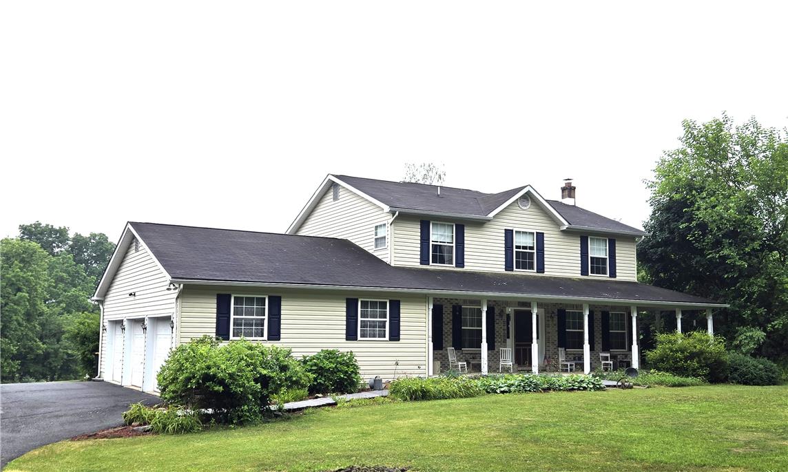 477 Quiet Valley Road Mount Bethel, PA 18343 - Photo 2 of 53 A classic facade with a welcoming porch and attached garage defines this charming residence.