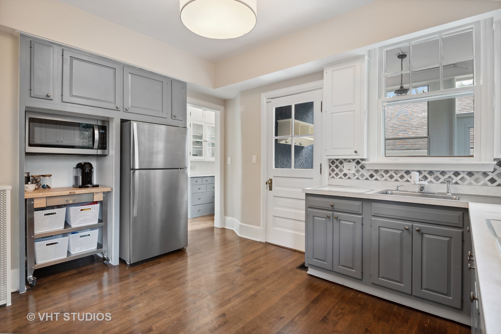 160 Sheridan Road Glencoe, IL 60093 - Photo 13 of 42 a kitchen with granite countertop a refrigerator and a sink
