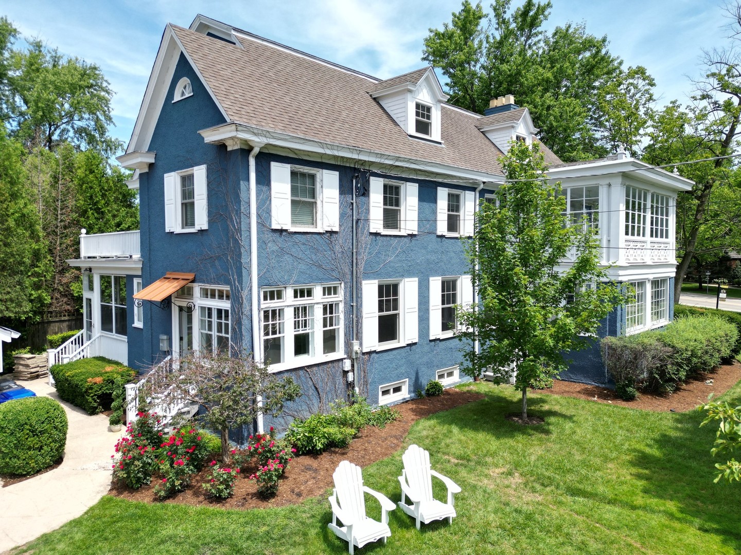 160 Sheridan Road Glencoe, IL 60093 - Photo 36 of 42 a front view of a house with a yard and trees